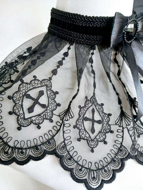 Side detail of gothic lace cross collar showing scalloped border, sheer tulle fabric and embroidered cross motifs in ornate frames - Victorian Velvet