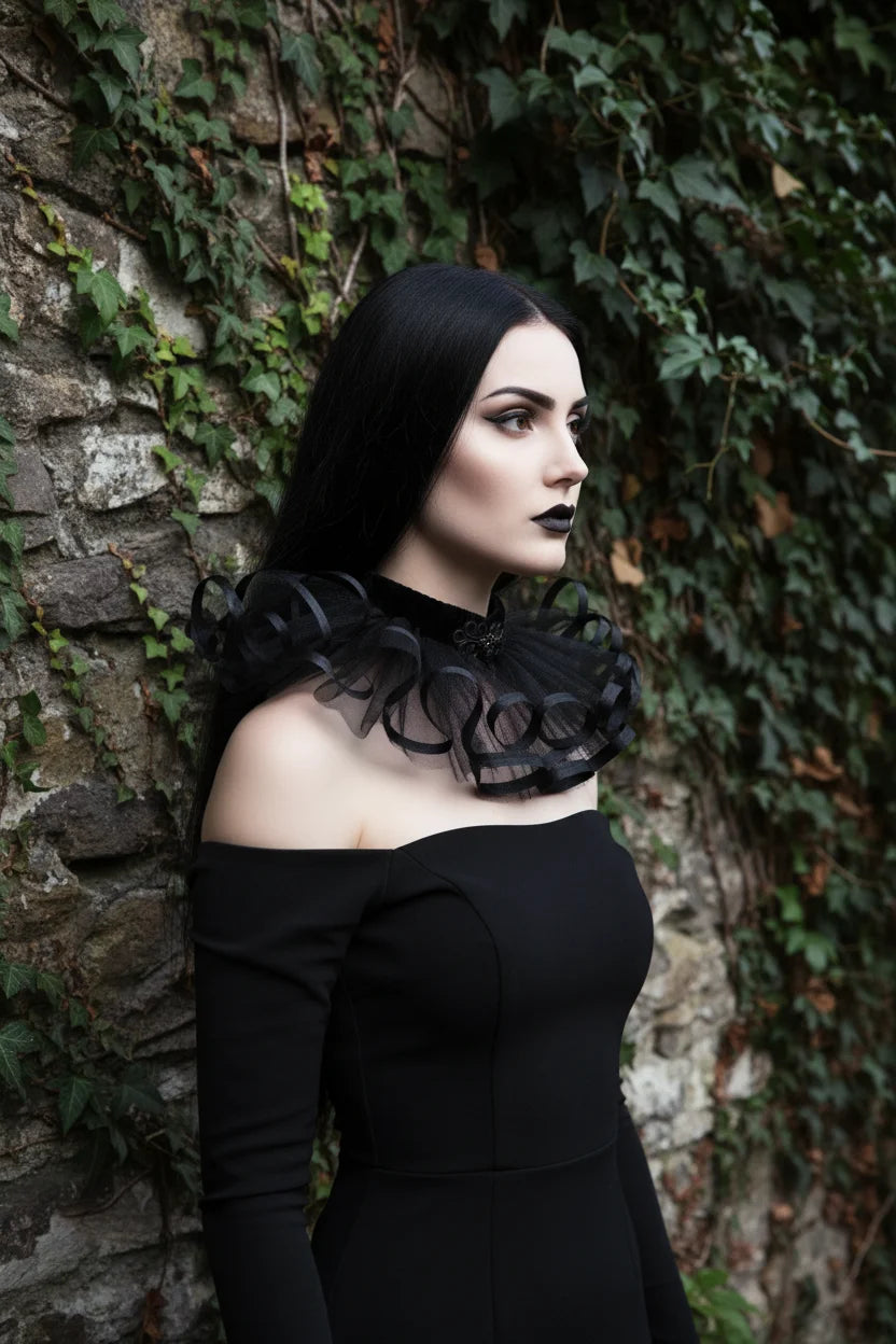 Side view of The Shadow Bloom dramatic black tulle collar with satin ribbon curls and velvet neckband, worn by a pale gothic woman with black hair and dark lips, ivy stone wall background — Victorian Velvet