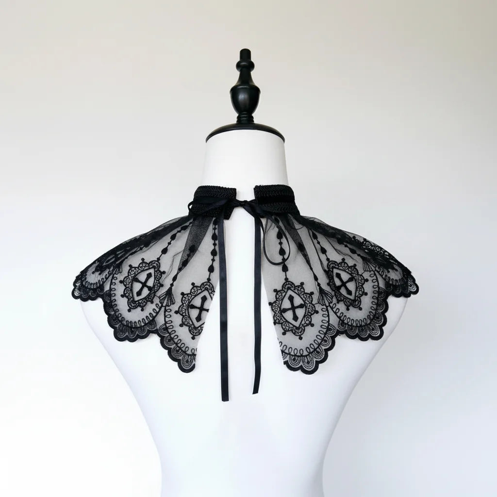 Back view of gothic black lace collar with butterfly wing panels and cross embroidery, black ribbon tie, white background - Victorian Velvet