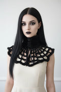 Gothic Spider Web Velour Collar with black satin roses – pale gothic model front view wearing black web collar over white sleeveless dress, dark makeup, white background - Victorian Velvet