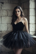 Black tulle tutu skirt with black satin ribbon bow at waist, worn with black velvet corset top, front view, gothic fashion editorial - Victorian Velvet